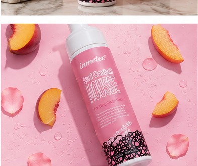 immetee mousse bottle flat-lay with peach slices
